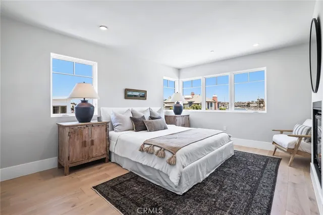 a bedroom with a bed and a couch