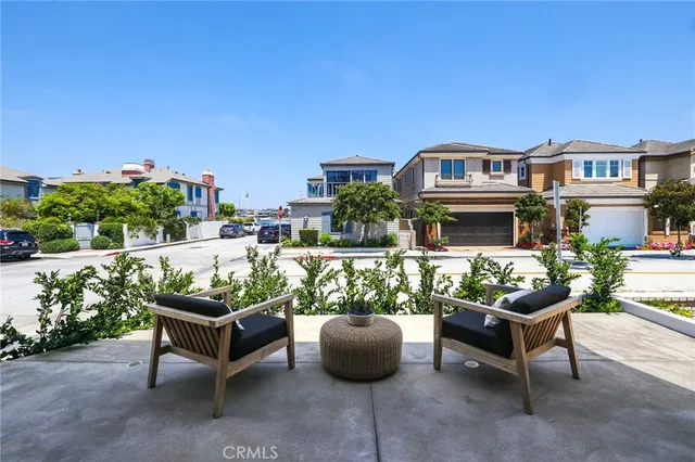 a outdoor living space with furniture and a potted plant