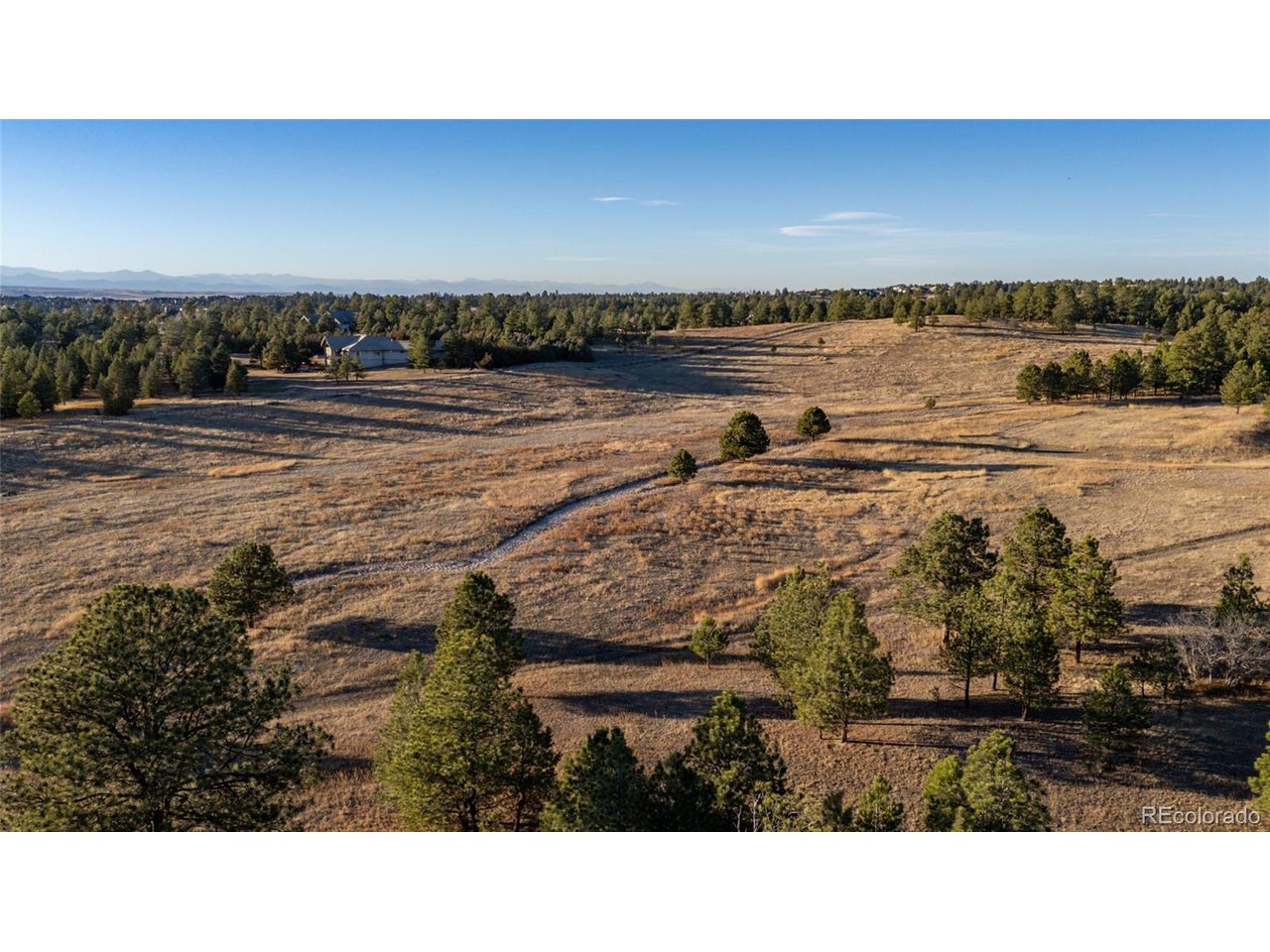 Woodhaven Ridge Road Parker, CO 80134 - Photo 22 of 36 a view of an ocean and city