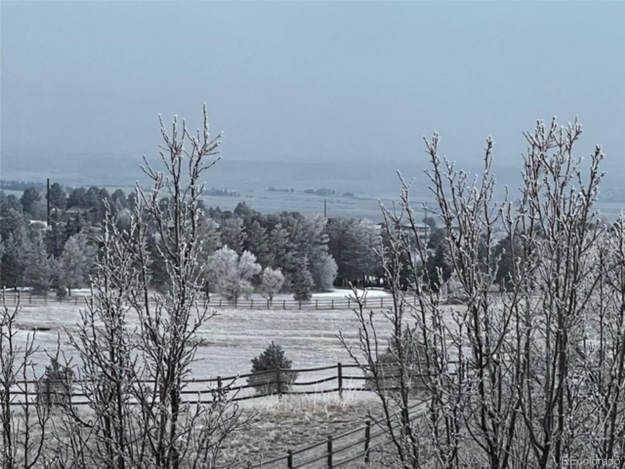 Woodhaven Ridge Road Parker, CO 80134 - Photo 31 of 36 a view of a covered with snow in the background