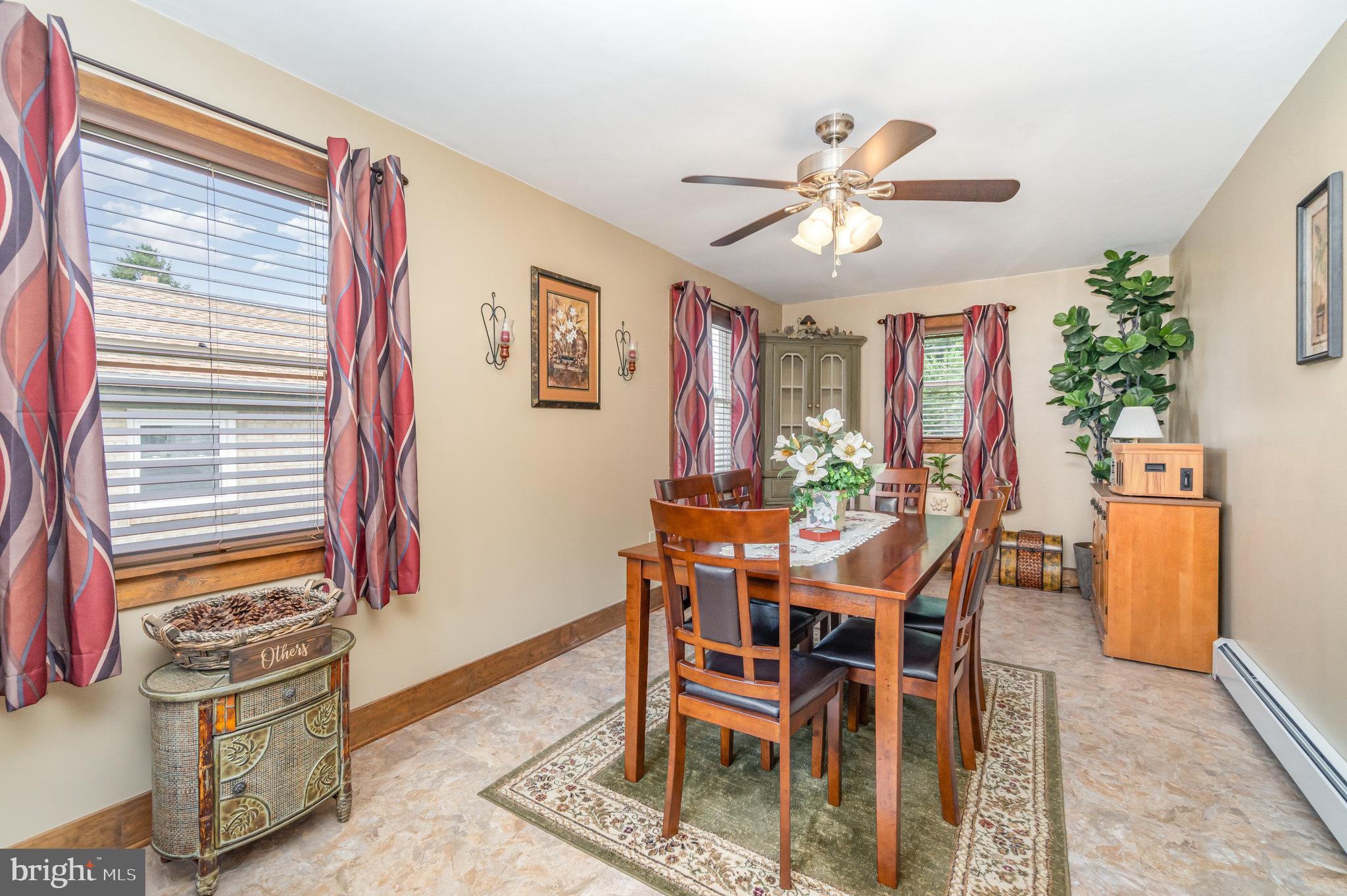 904 South 12th Street Lebanon, PA 17042 - Photo 11 of 32 a view of a dining room with furniture and a chandelier