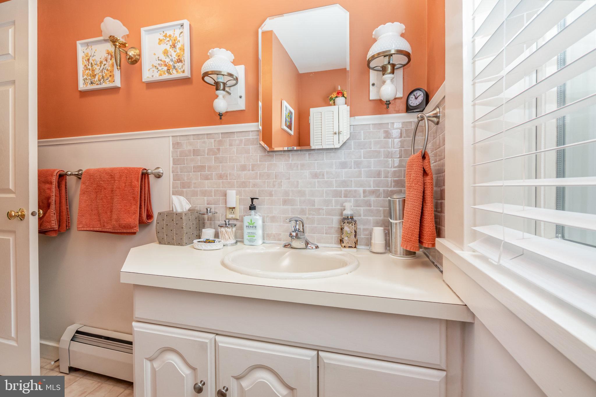 904 South 12th Street Lebanon, PA 17042 - Photo 20 of 32 a bathroom with a sink and a mirror