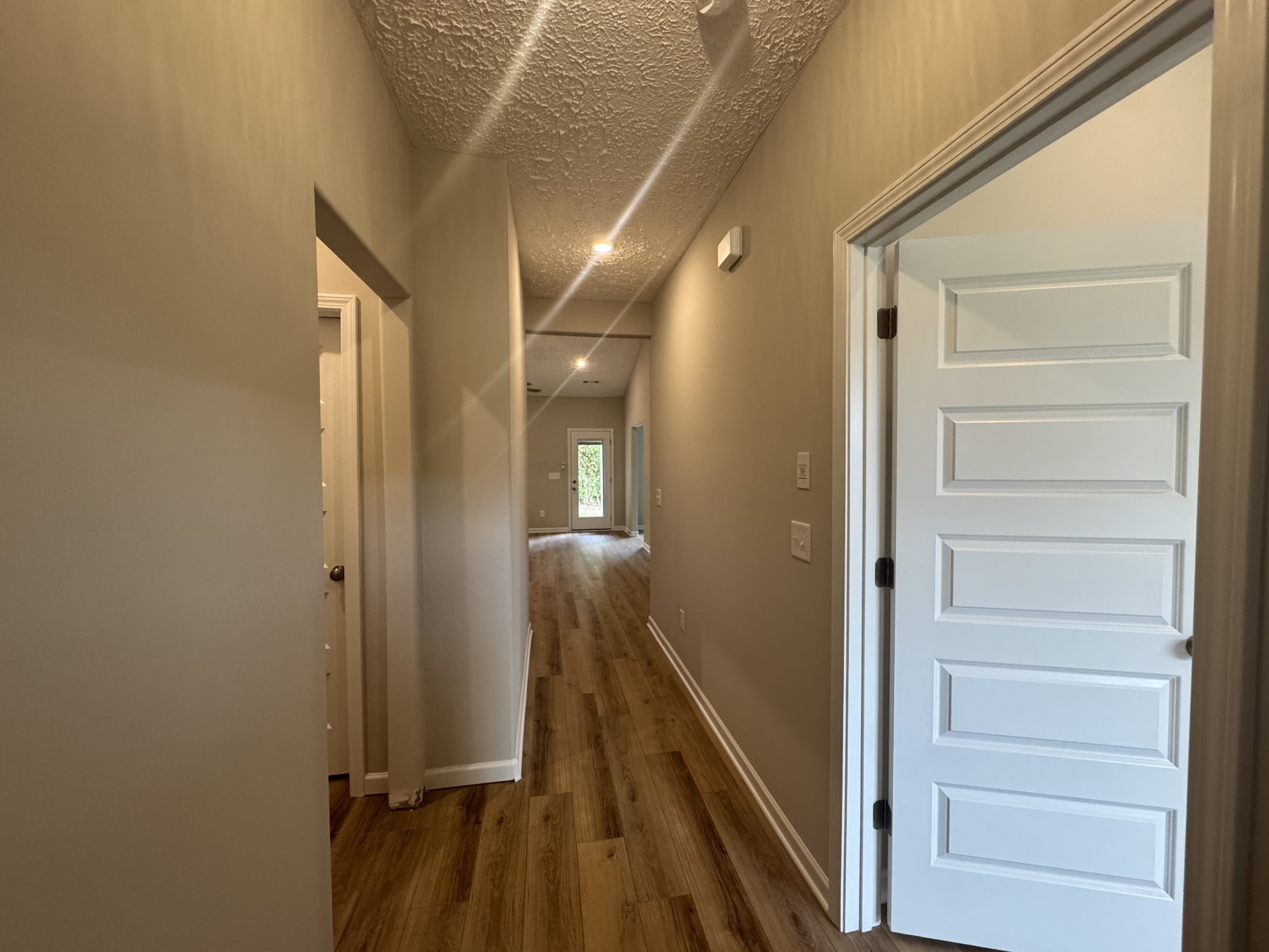 69 Laurel View Street Manchester, TN 37355 - Photo 4 of 15 a view of a hallway with wooden floor and staircase