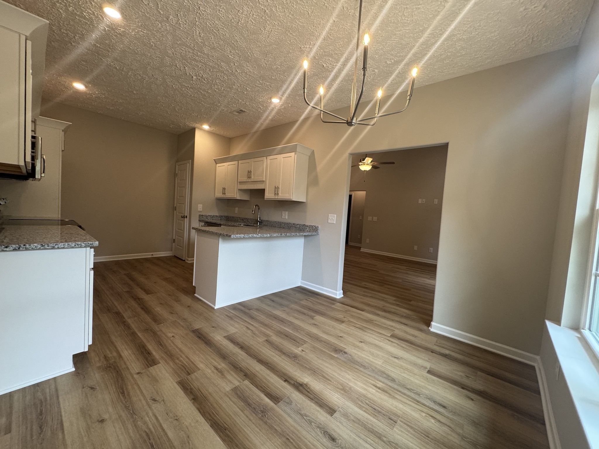 69 Laurel View Street Manchester, TN 37355 - Photo 8 of 15 a kitchen with stainless steel appliances granite countertop a sink and a stove top oven
