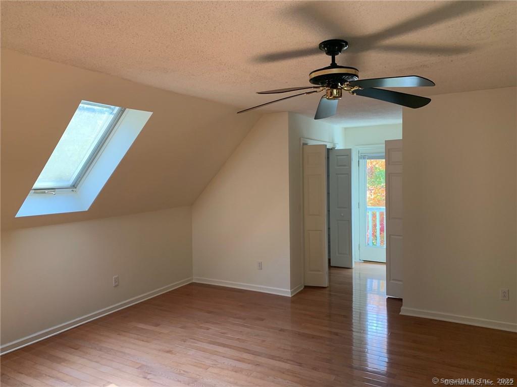 380 Huckleberry Hill Road Avon, CT 06001 - Photo 11 of 21 a view of empty room with wooden floor