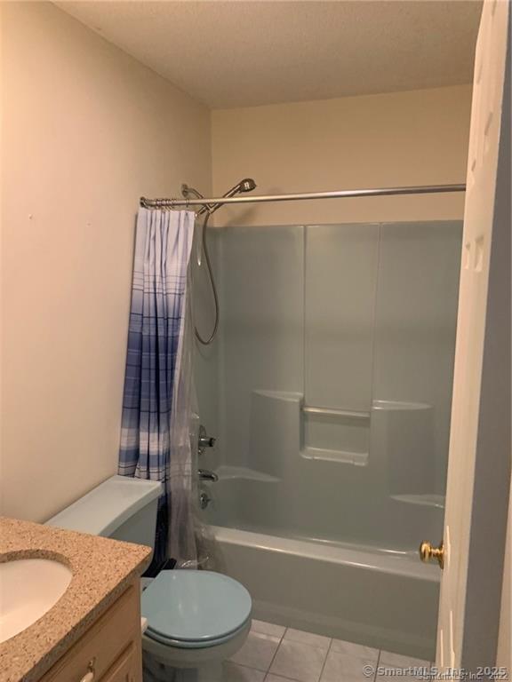 380 Huckleberry Hill Road Avon, CT 06001 - Photo 18 of 21 a bathroom with a granite countertop bathtub shower sink mirror and toilet