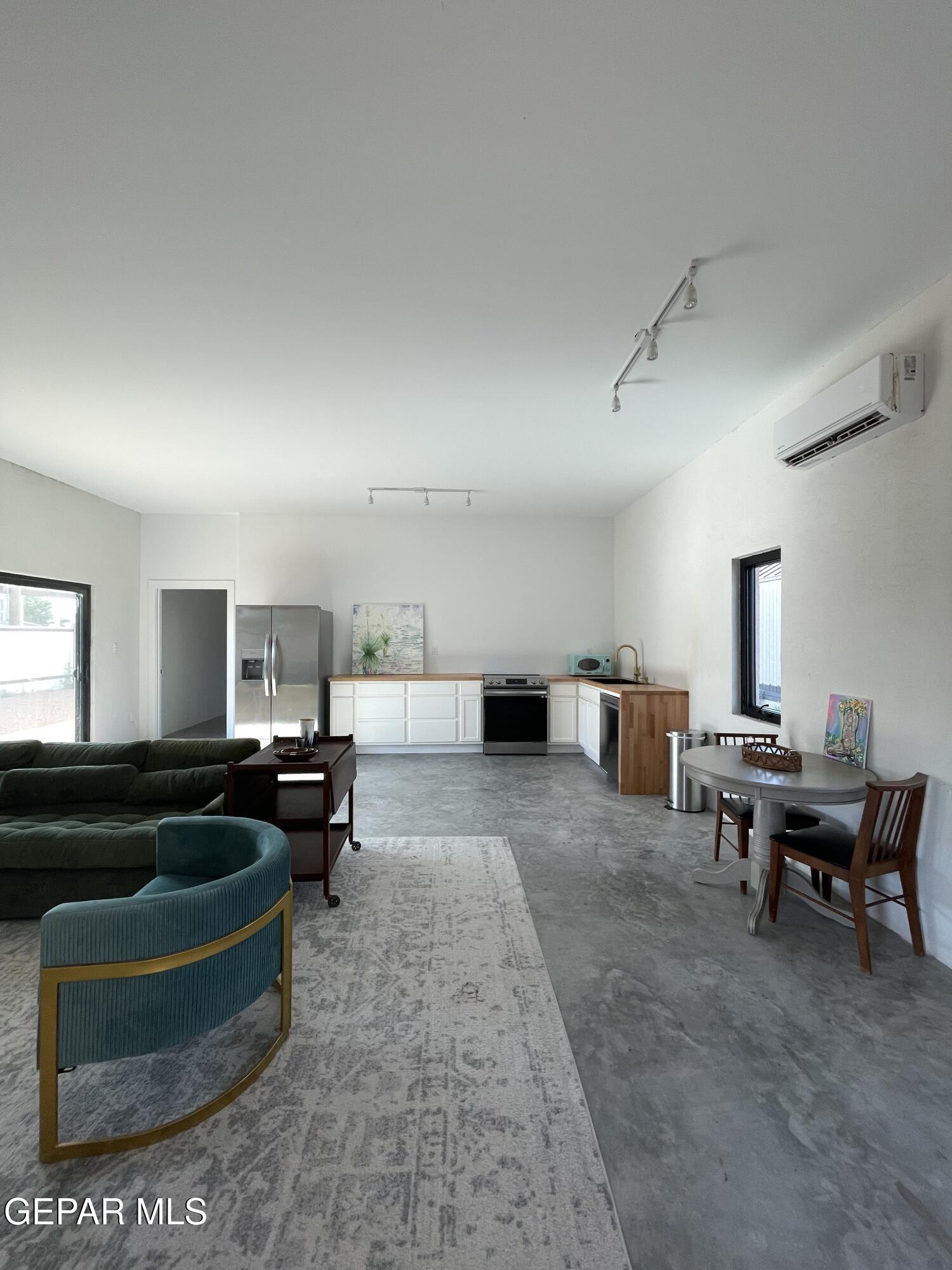 1402 Philadelphia Street Marfa, TX 79843 - Photo 3 of 11 a living room with furniture