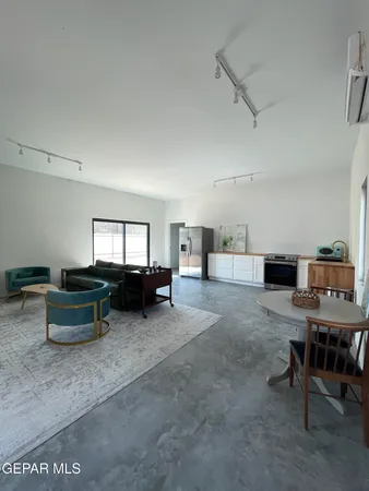 a bed room with furniture and a window
