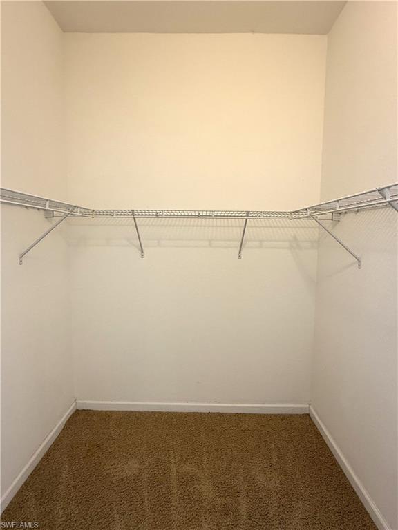 12990 Positano Circle, Unit 208 Naples, FL 34105 - Photo 11 of 20 a view of a room