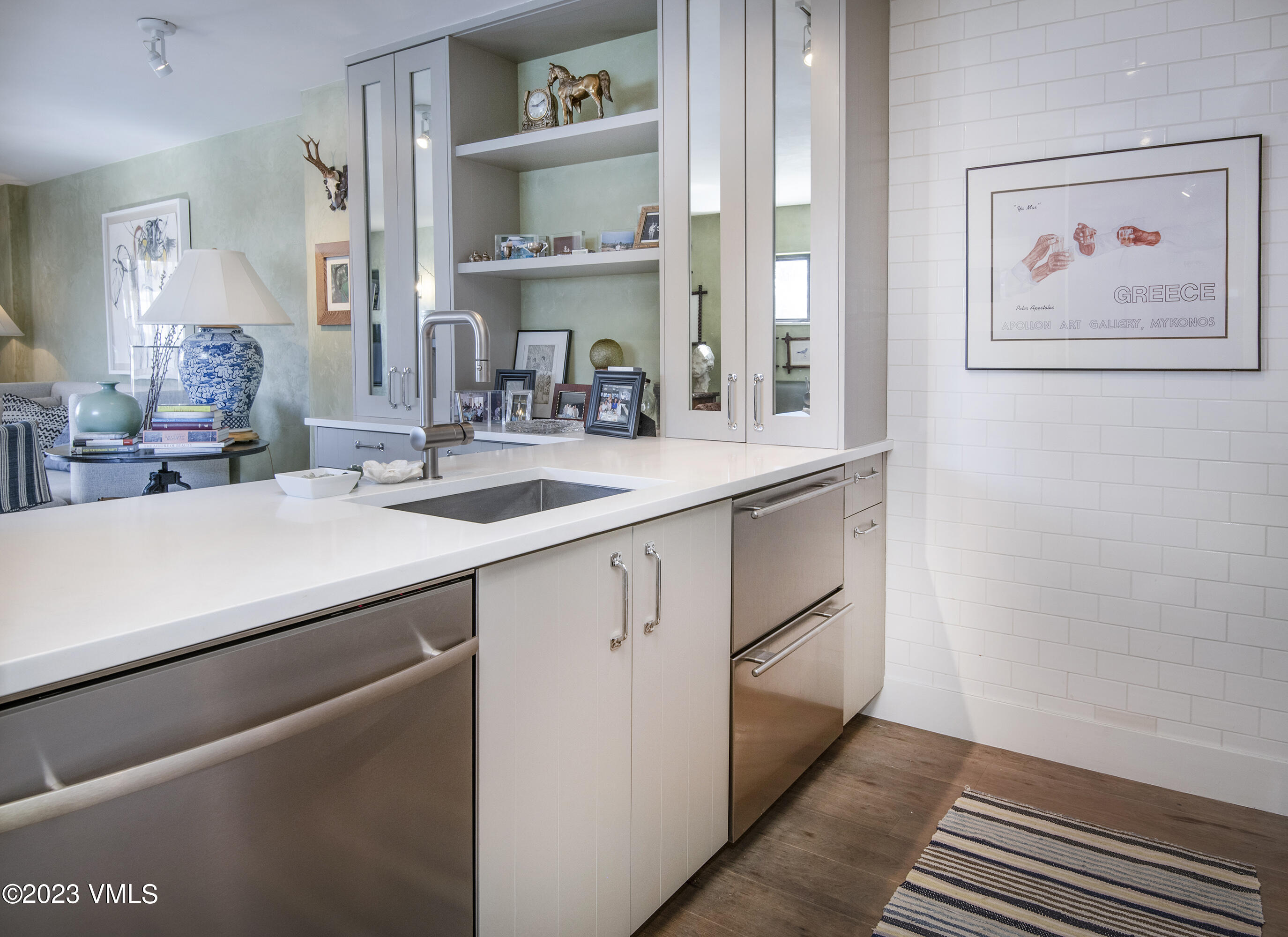 137 Benchmark Road, Unit 327 Avon, CO 81620 - Photo 14 of 43 a kitchen with cabinets and window