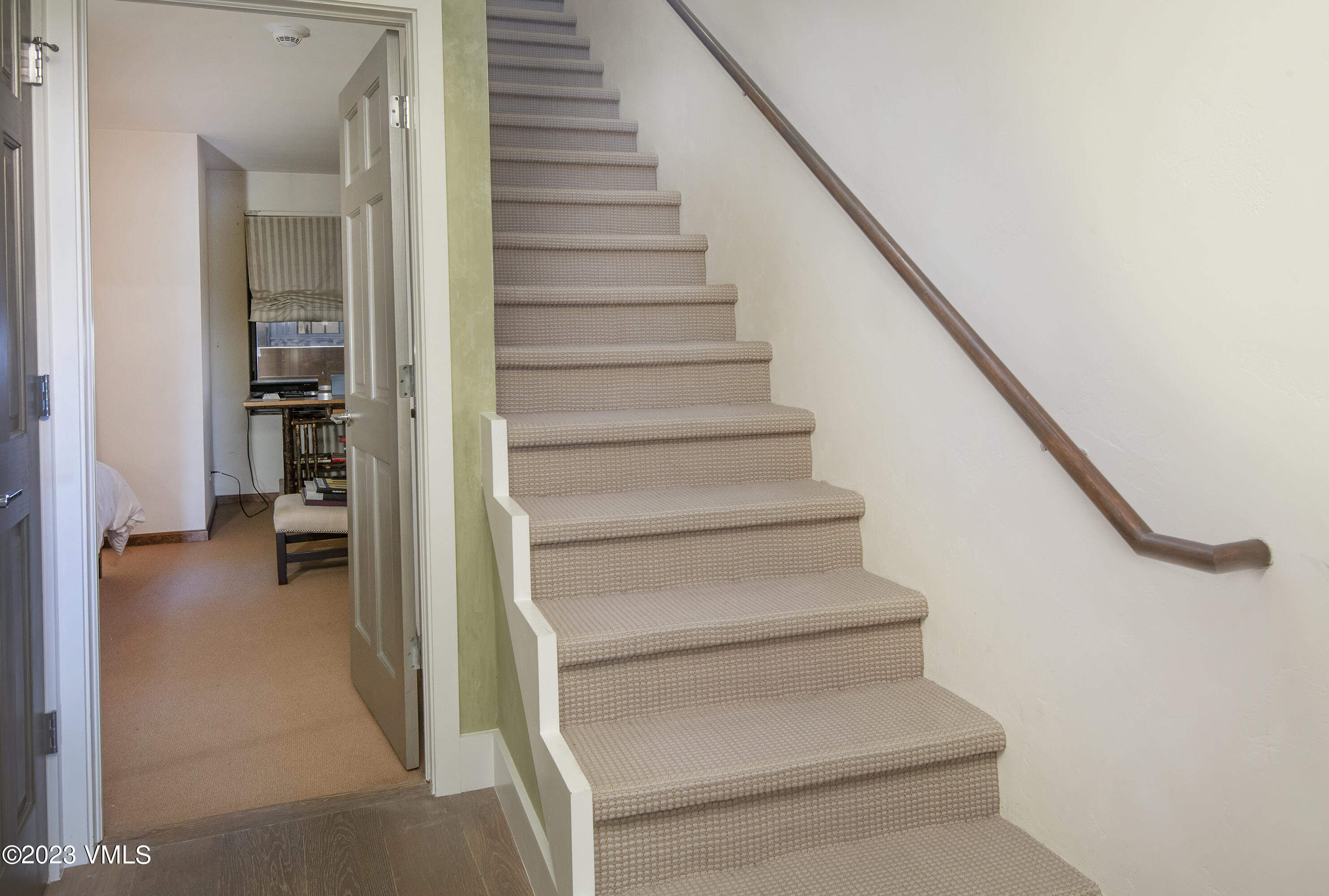 137 Benchmark Road, Unit 327 Avon, CO 81620 - Photo 21 of 43 a view of entryway and hall with wooden floor