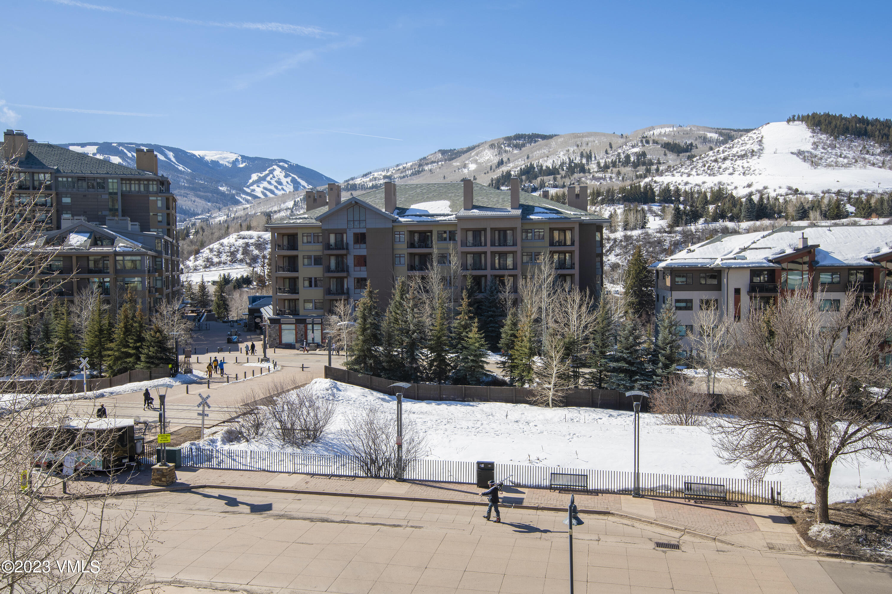 137 Benchmark Road, Unit 327 Avon, CO 81620 - Photo 29 of 43 a view of a house with a yard and sitting area