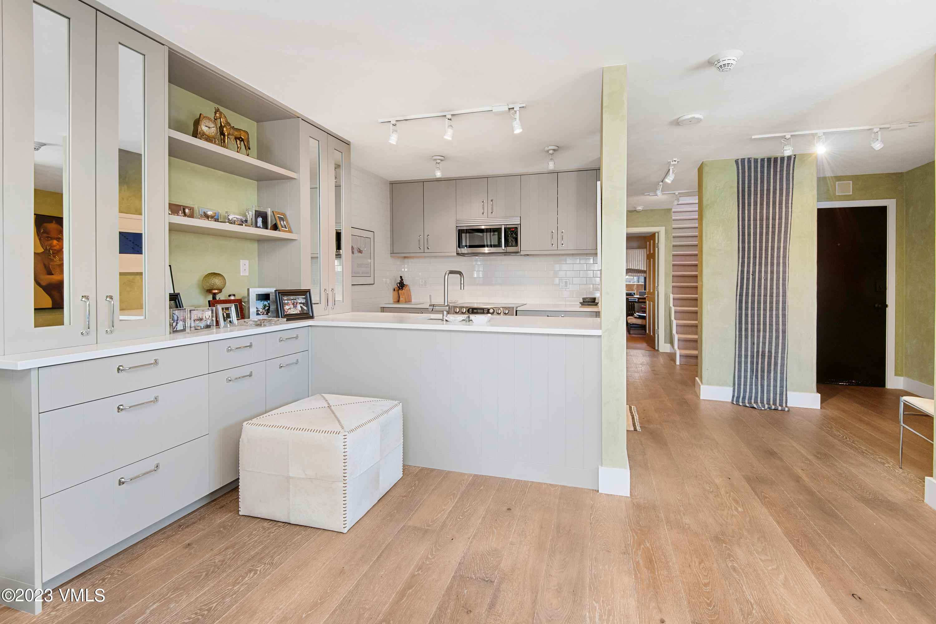 137 Benchmark Road, Unit 327 Avon, CO 81620 - Photo 10 of 43 a kitchen with a sink a refrigerator and cabinets