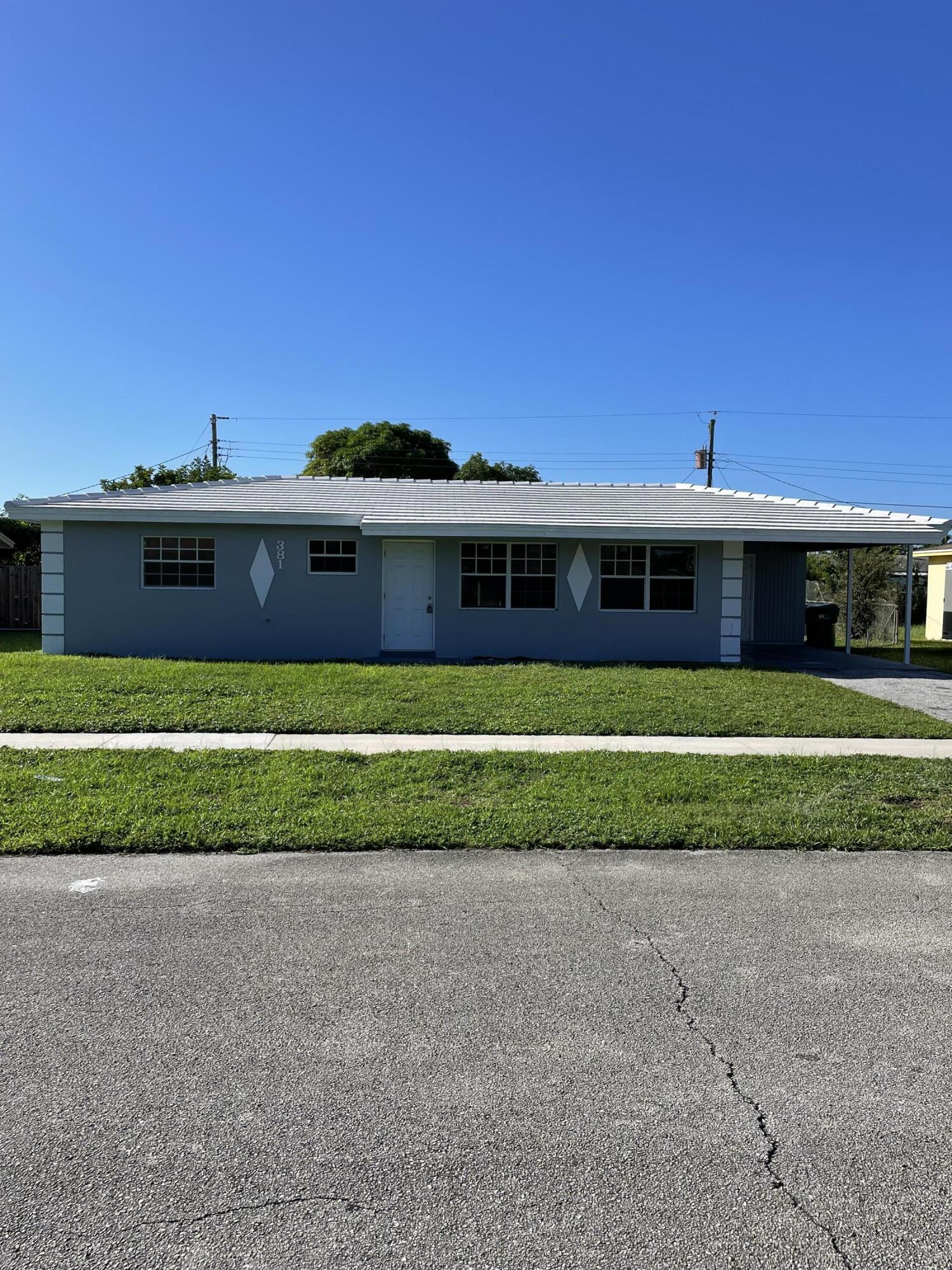 381 West 32nd Street Riviera Beach, FL 33404 - Photo 1 of 12 IMG_3823