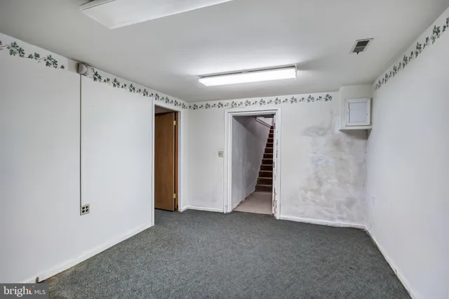 a view of balcony with wooden floor and fence