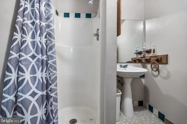 a view of a house with a yard and furniture