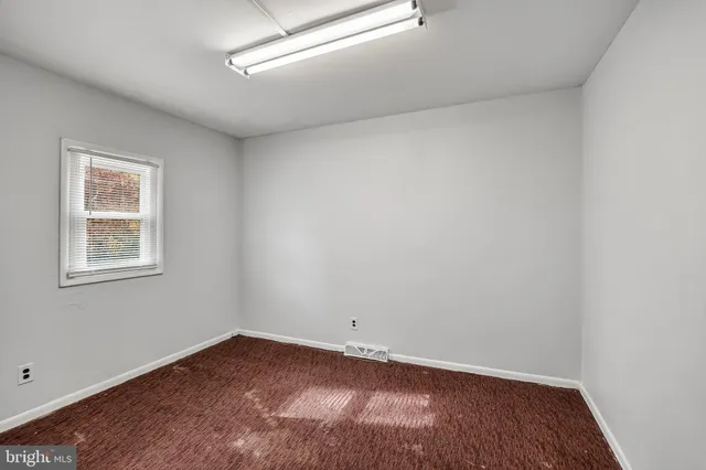 an empty room with a workbench