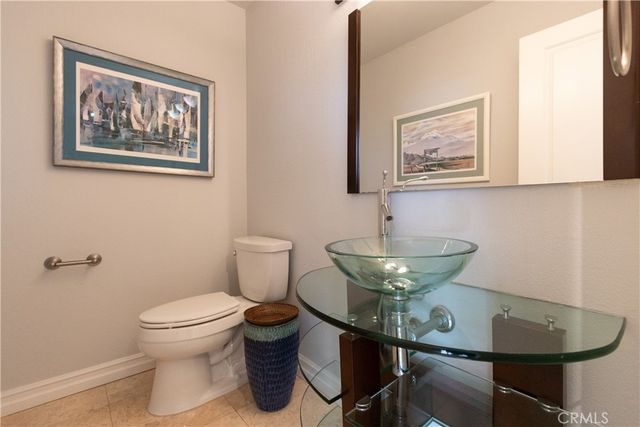 a bathroom with a toilet and a sink