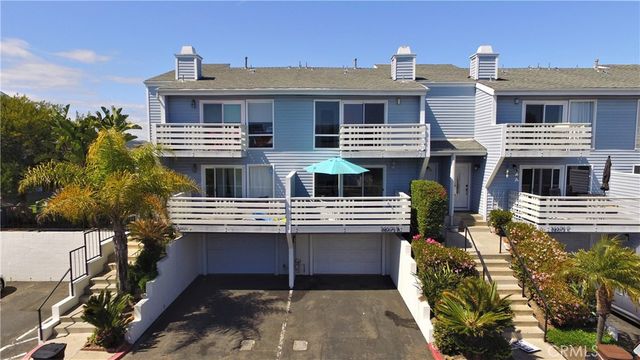 front view of a house with a balcony