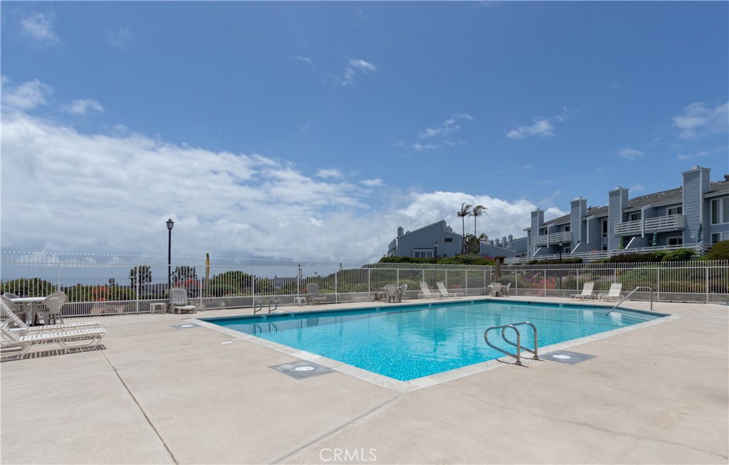24601 B Harbor View Drive Dana Point, CA 92629 - Photo 33 of 36 a view of a swimming pool and a chairs