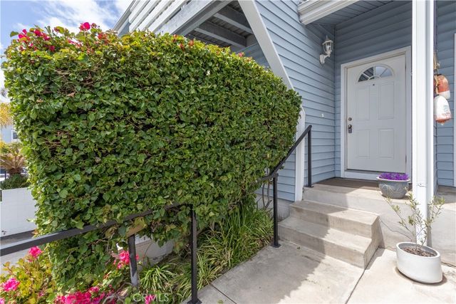 a house with a flower garden
