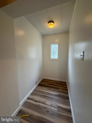 a bathroom with a shower a toilet and sink