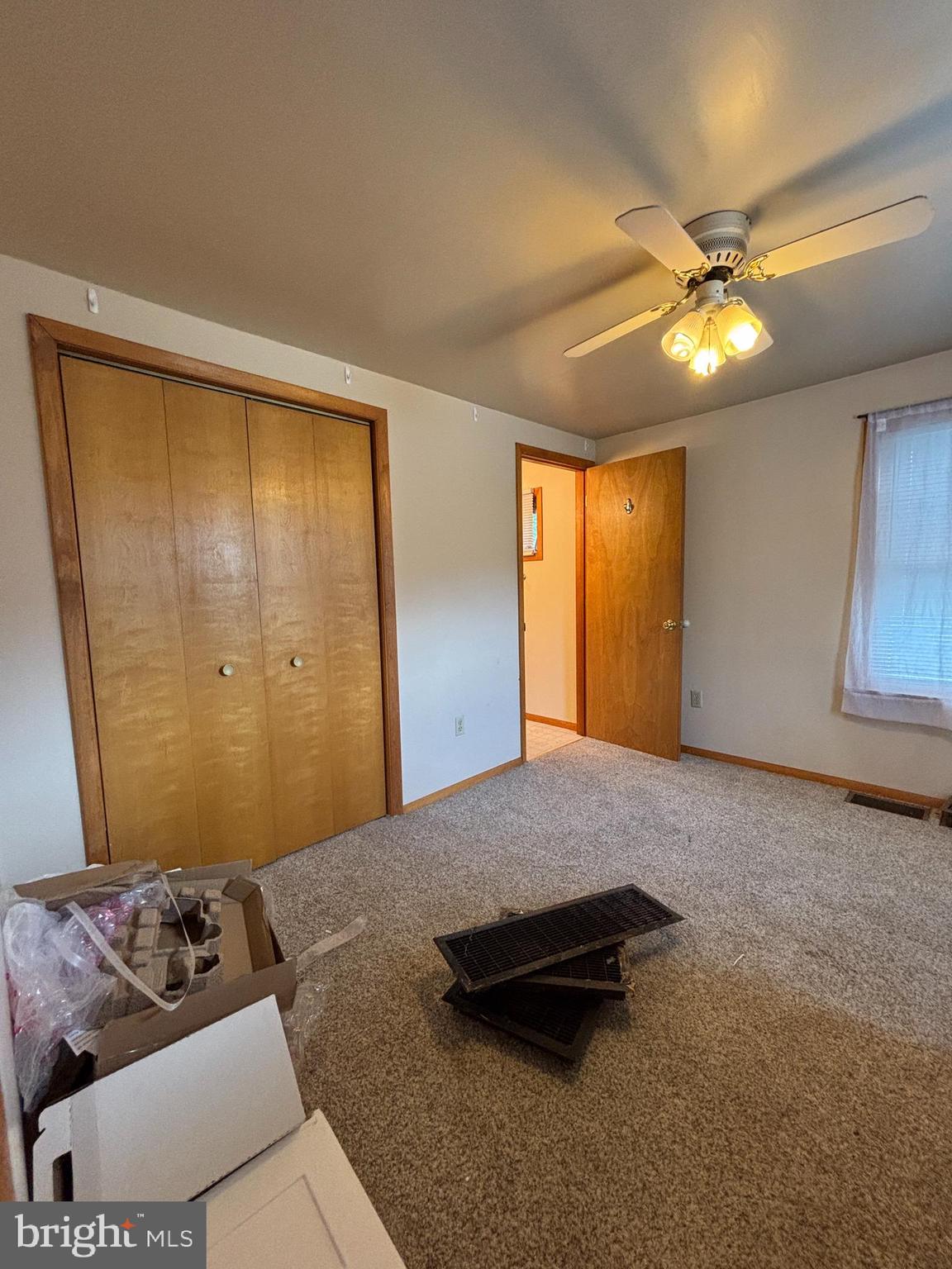 488 State Street Sandy Ridge, PA 16677 - Photo 21 of 36 a bedroom with a bed and a window