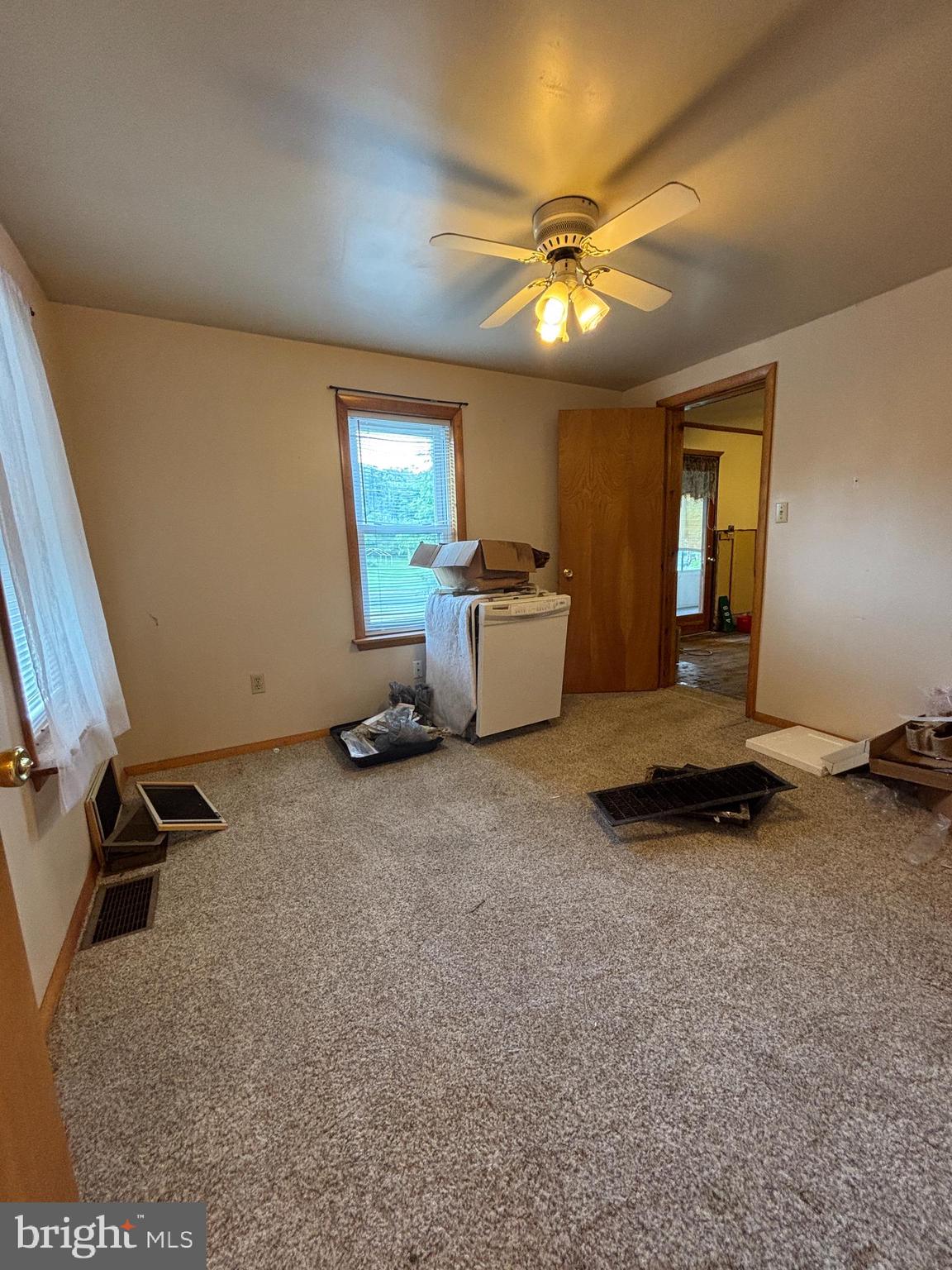 488 State Street Sandy Ridge, PA 16677 - Photo 22 of 36 a living room with furniture and a ceiling fan