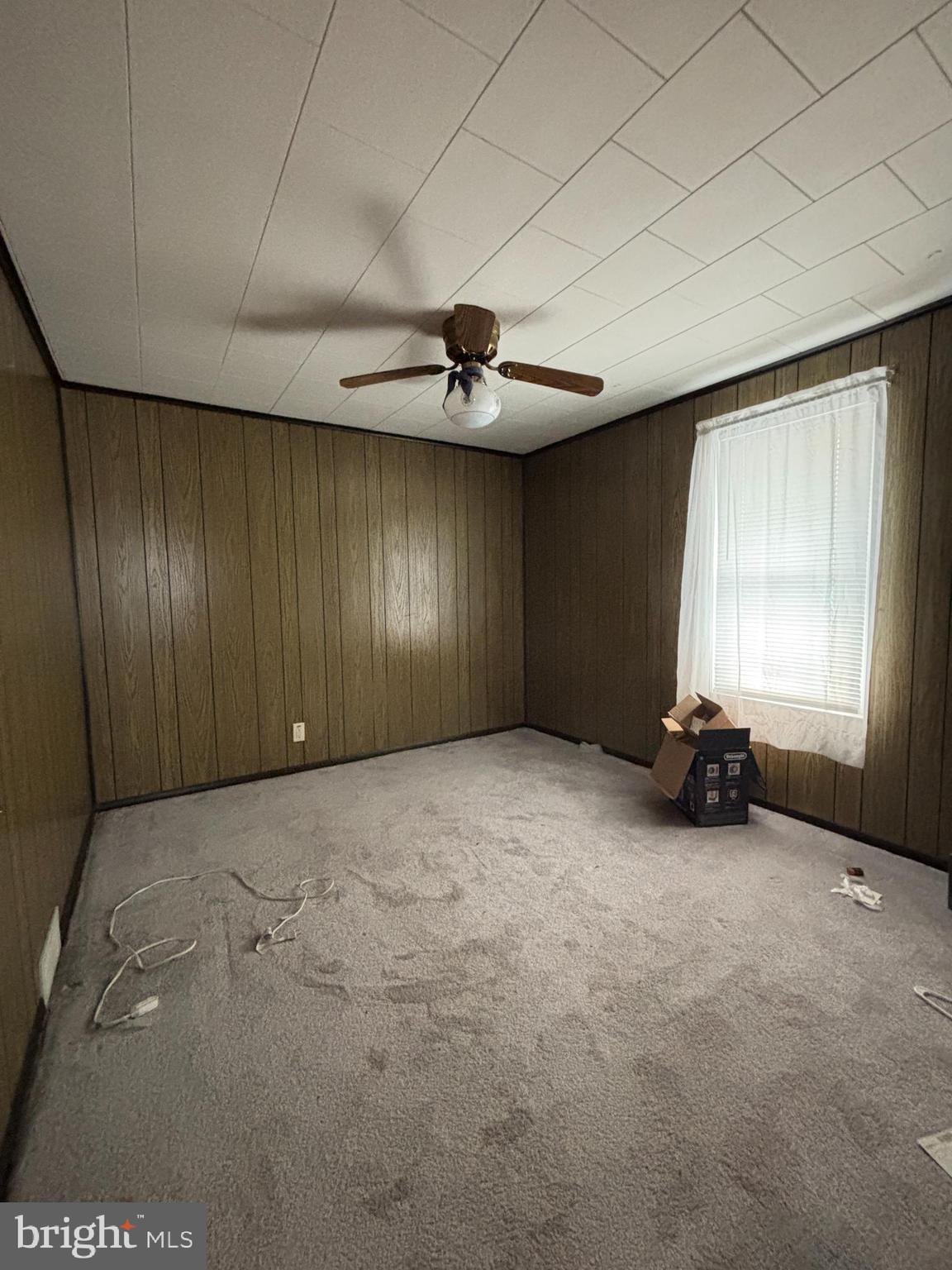 488 State Street Sandy Ridge, PA 16677 - Photo 24 of 36 a view of an empty room with a window