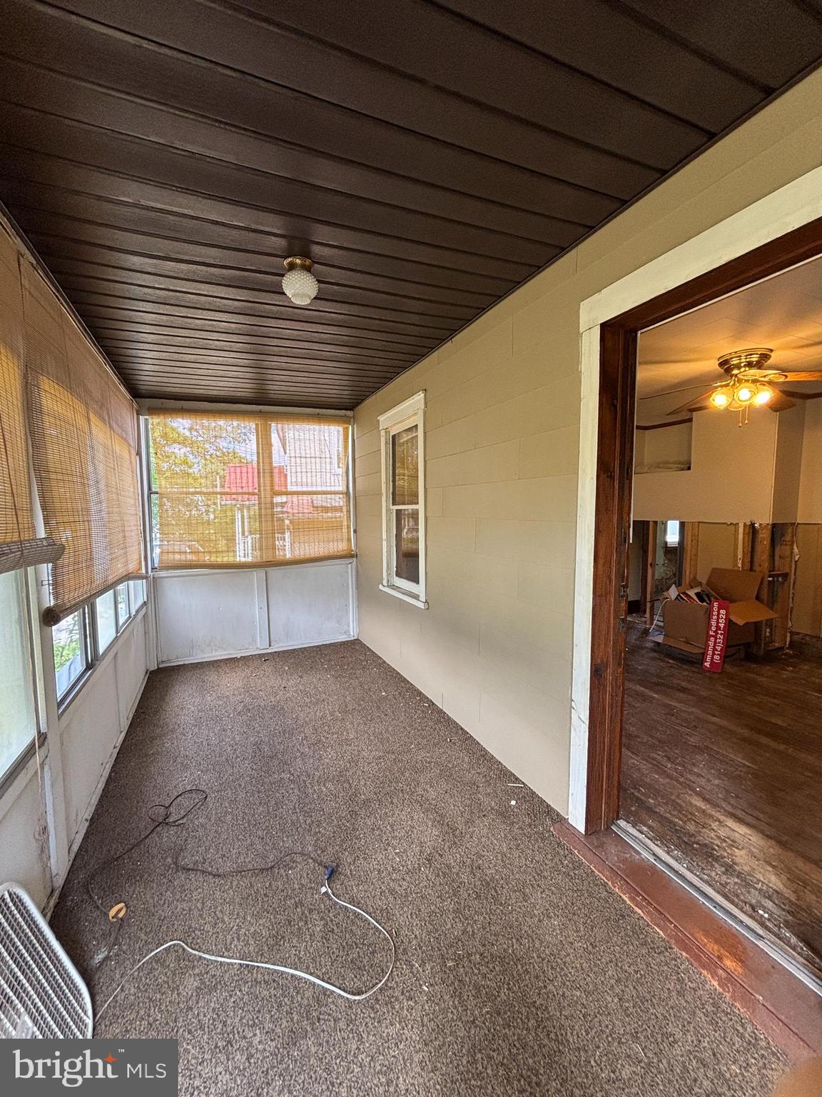488 State Street Sandy Ridge, PA 16677 - Photo 32 of 36 a view of an empty room with a window