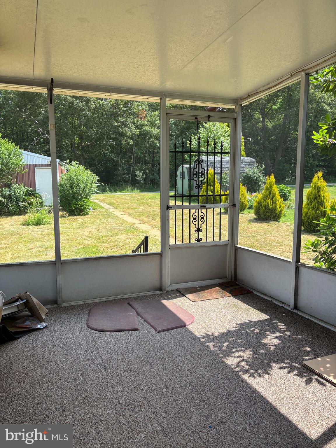 488 State Street Sandy Ridge, PA 16677 - Photo 33 of 36 a view of an empty room with a large window