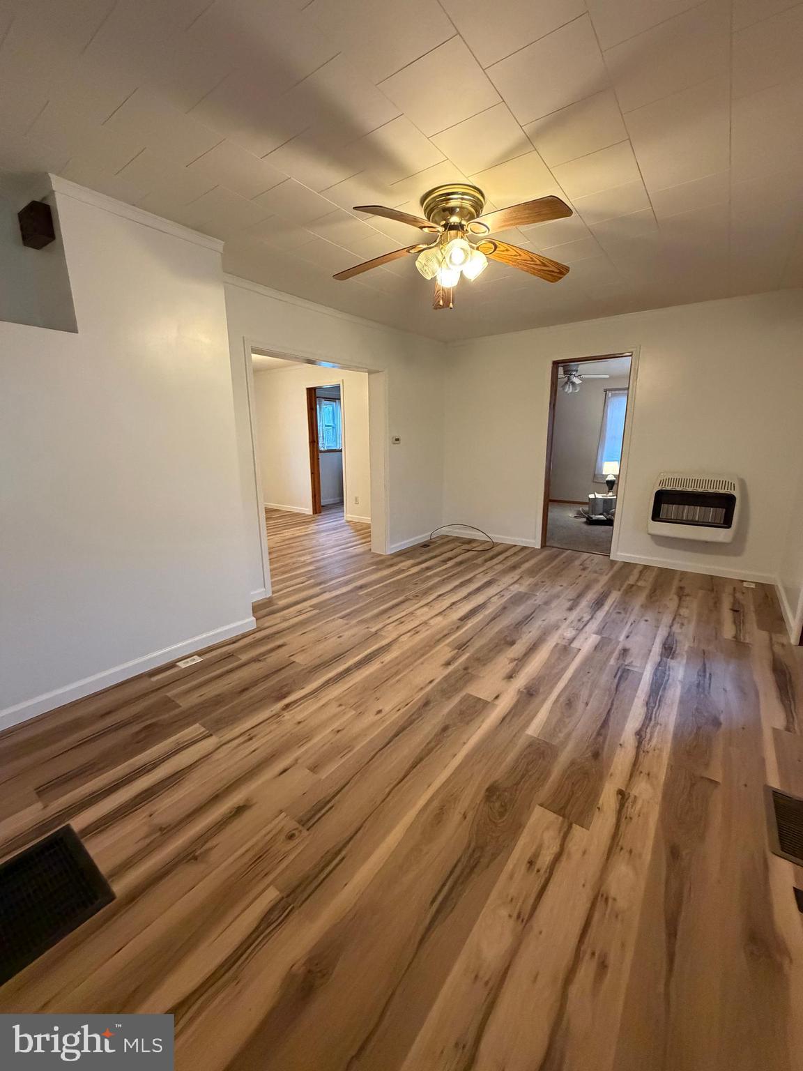 488 State Street Sandy Ridge, PA 16677 - Photo 7 of 36 a view of empty room with wooden floor