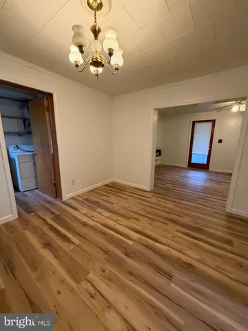a view of a room with a chandelier