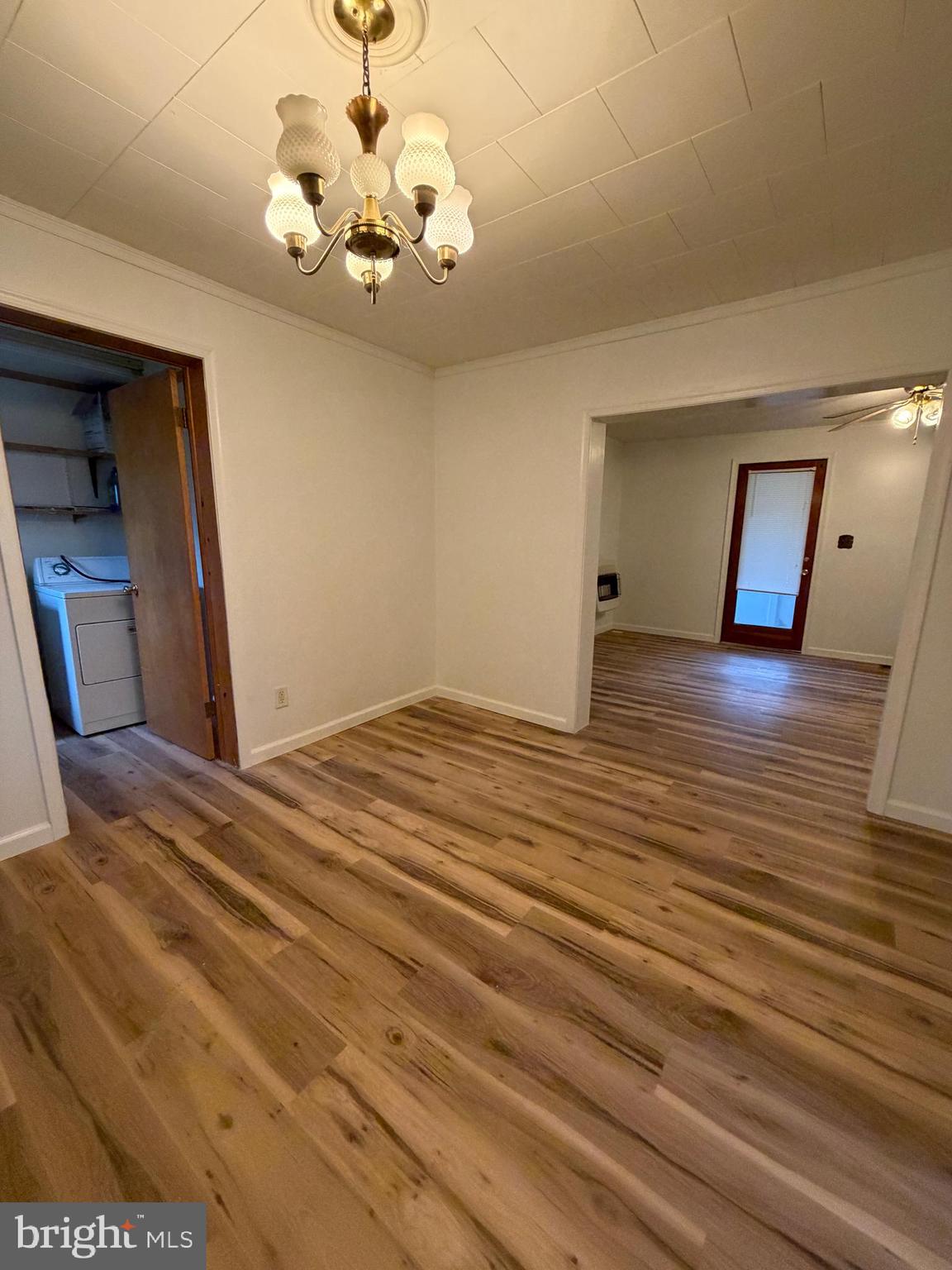 488 State Street Sandy Ridge, PA 16677 - Photo 10 of 36 a view of a room with a chandelier