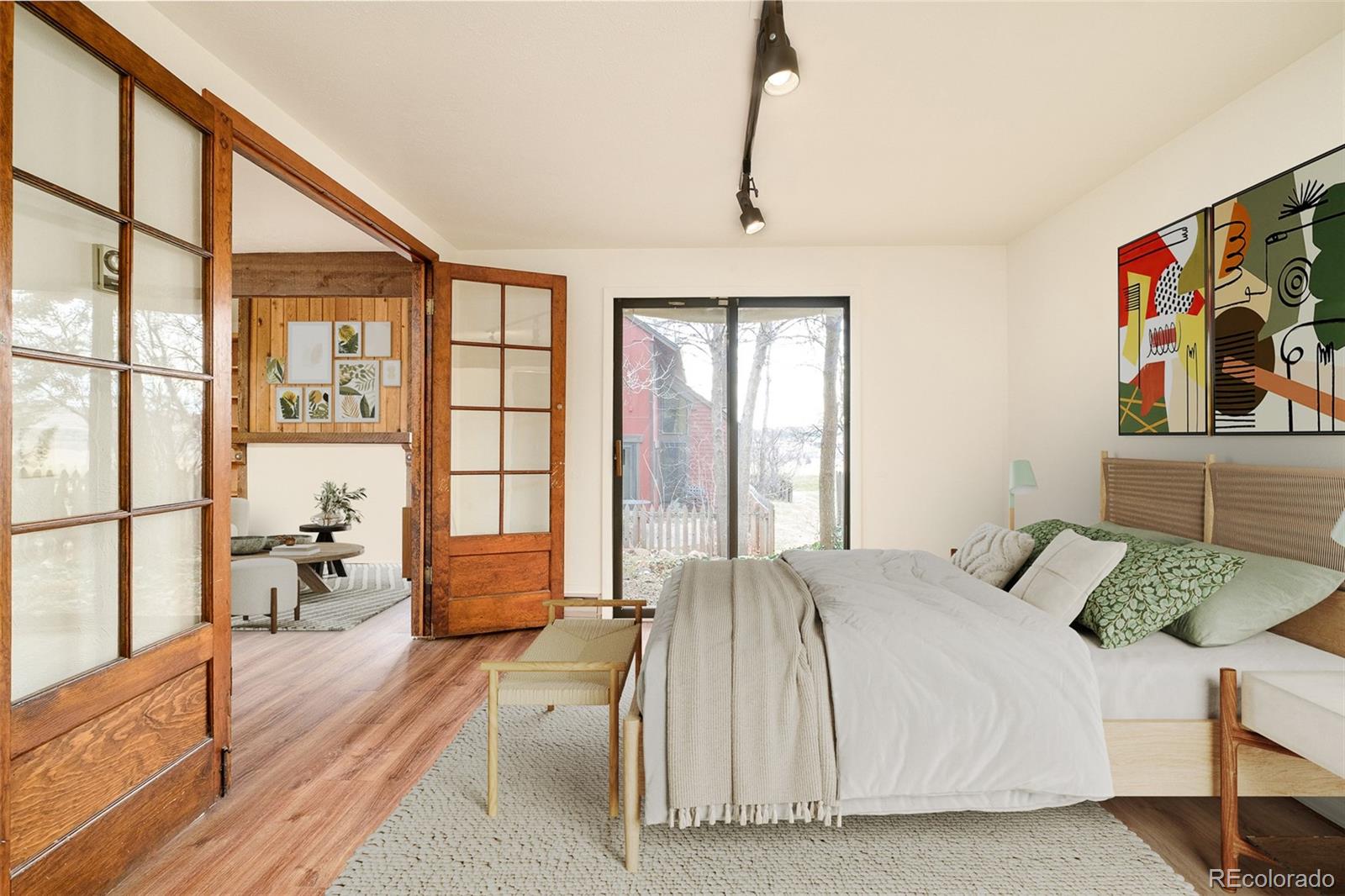 3760 Smuggler Place Boulder, CO 80305 - Photo 15 of 40 a bedroom with a bed and a large window