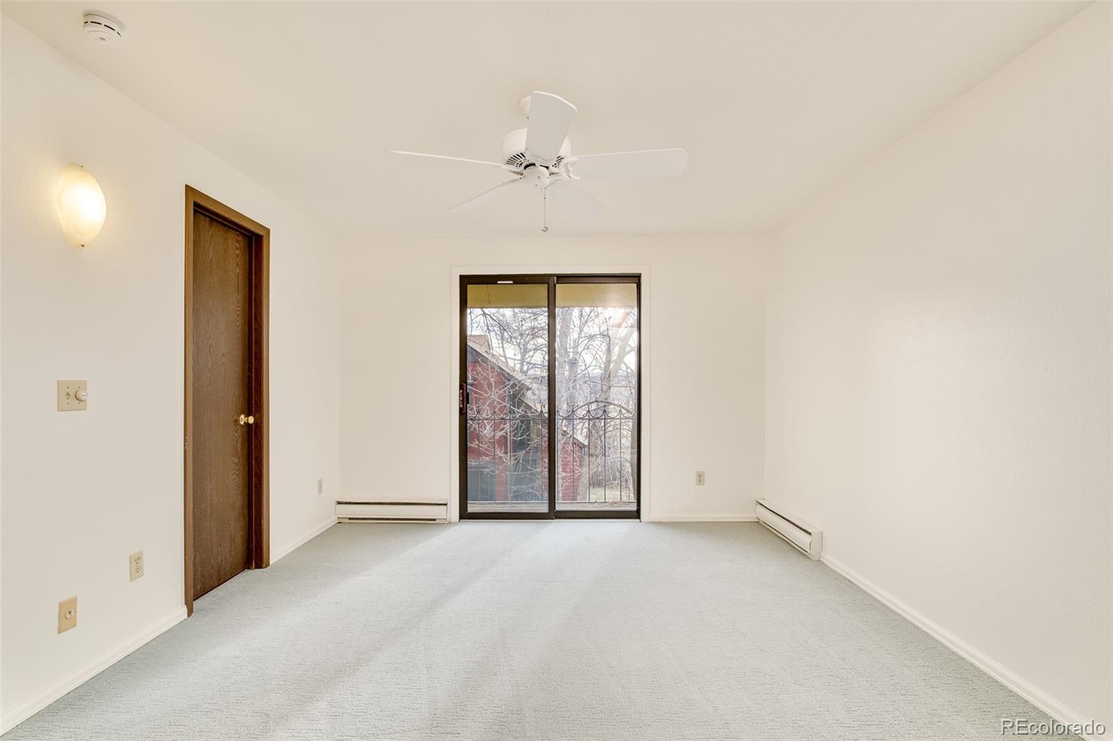 3760 Smuggler Place Boulder, CO 80305 - Photo 21 of 40 an empty room with windows and closet