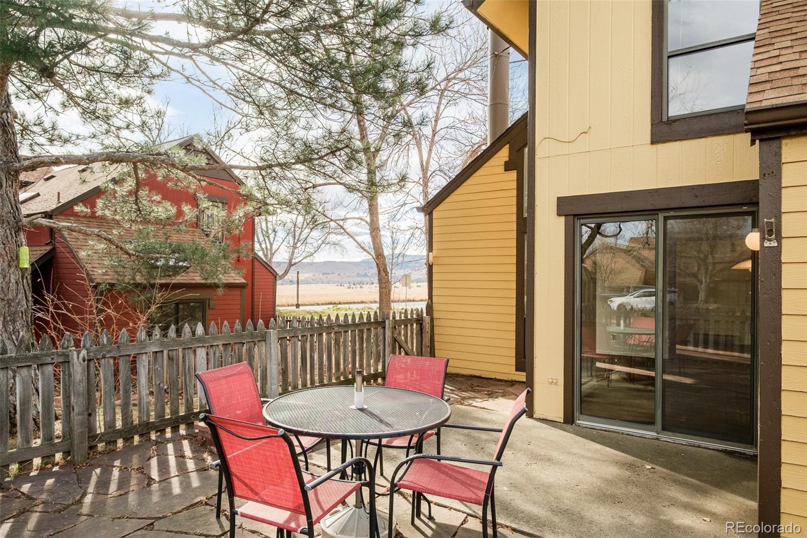 3760 Smuggler Place Boulder, CO 80305 - Photo 30 of 40 a view of a chairs and table in the balcony