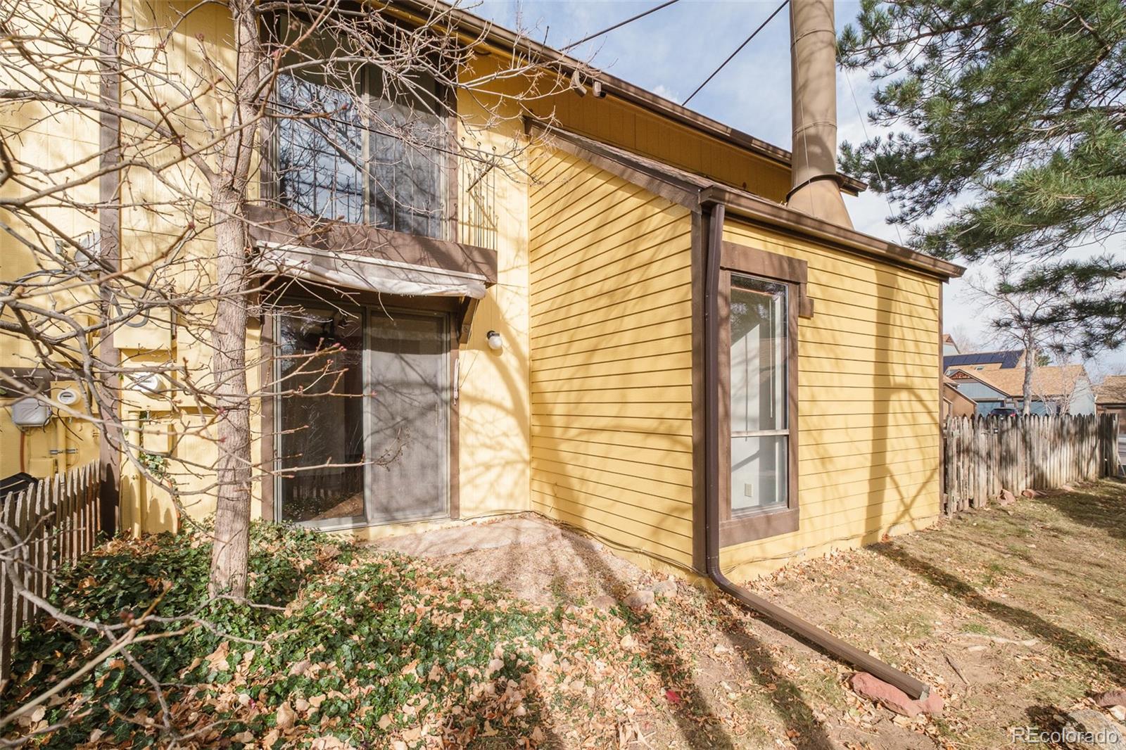 3760 Smuggler Place Boulder, CO 80305 - Photo 31 of 40 a view of a brick house with a large windows