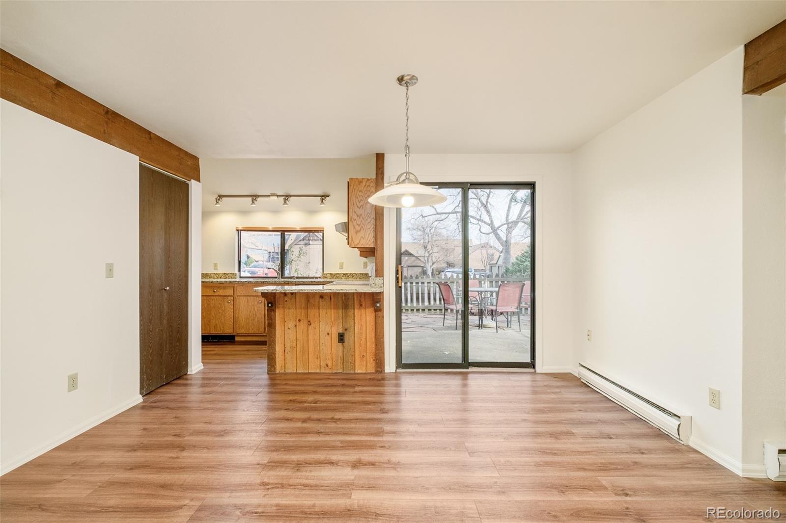 3760 Smuggler Place Boulder, CO 80305 - Photo 10 of 40 a view of a room with wooden floor and a window