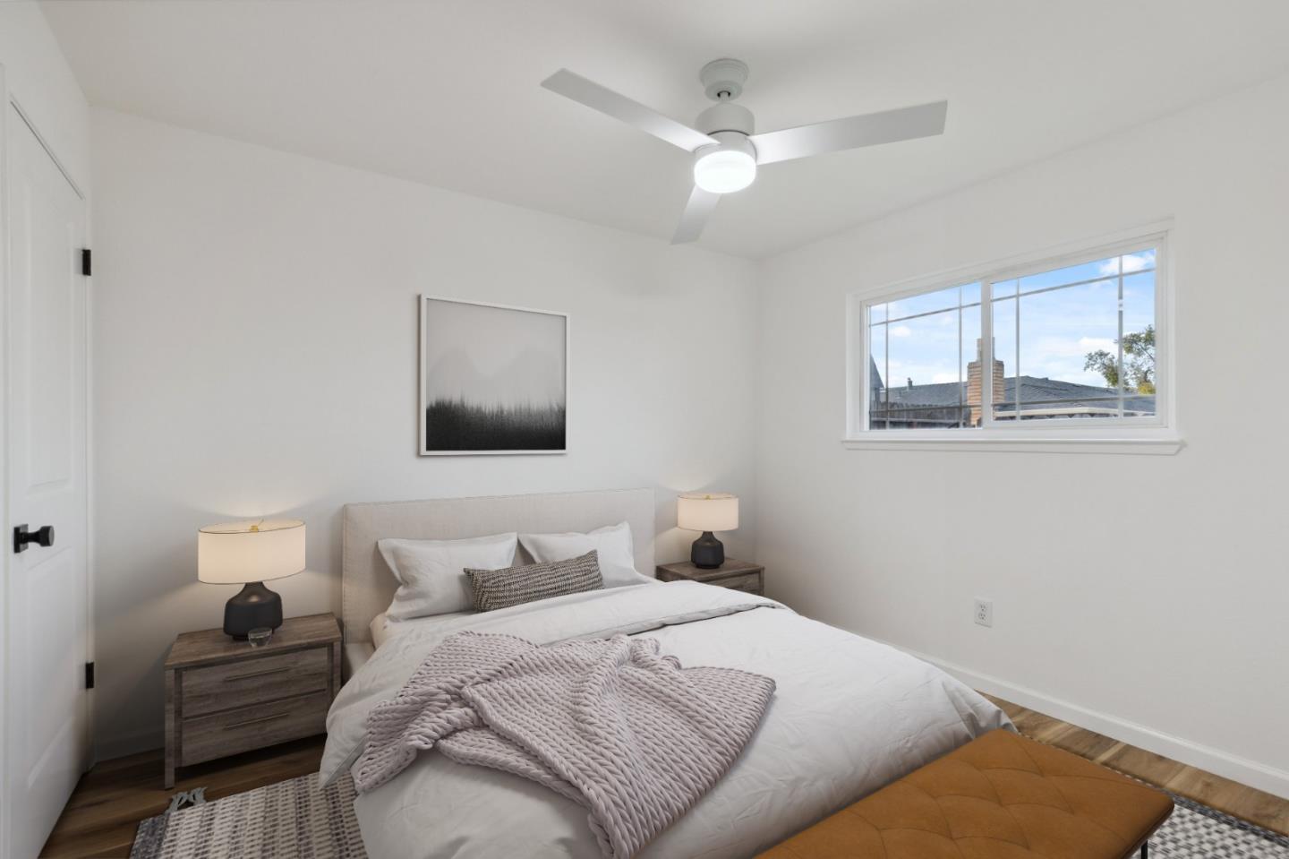 1413 Clevenger Drive Modesto, CA 95356 - Photo 23 of 37 a bedroom with a bed and a chandelier