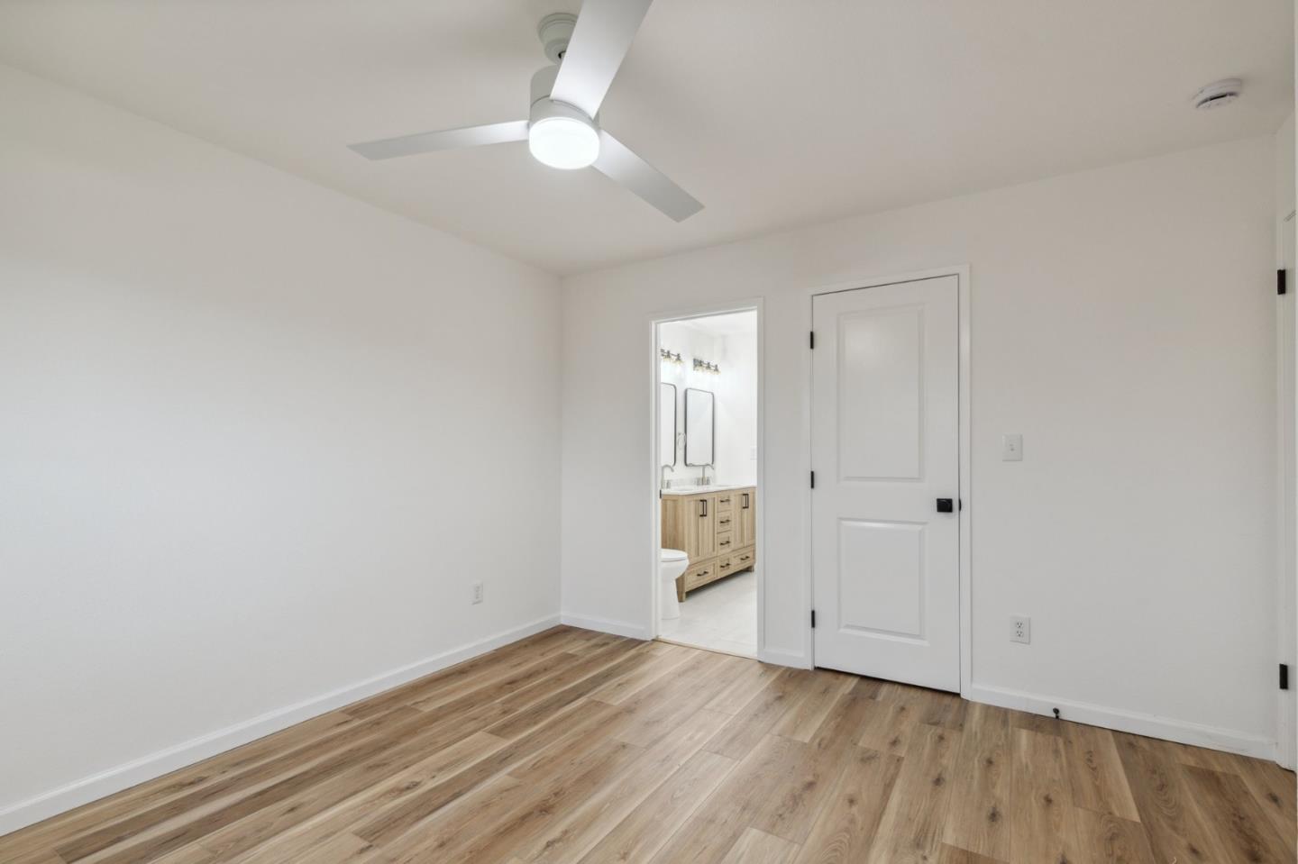 1413 Clevenger Drive Modesto, CA 95356 - Photo 27 of 37 wooden floor in an empty room