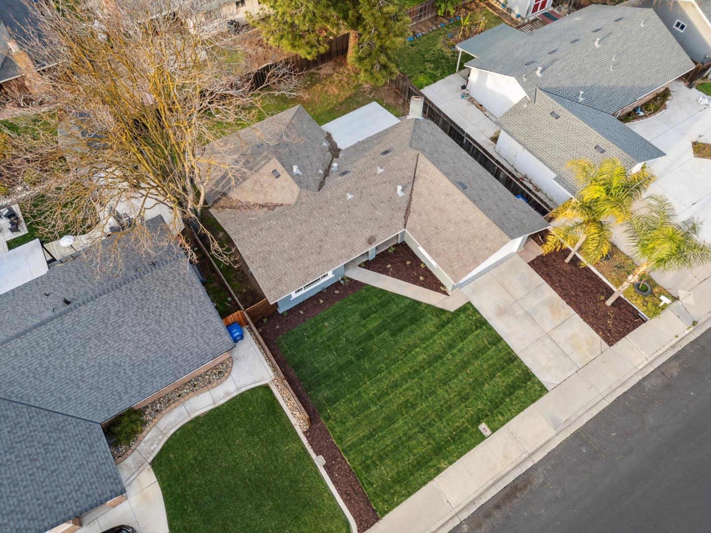 1413 Clevenger Drive Modesto, CA 95356 - Photo 33 of 37 an aerial view of a house with garden