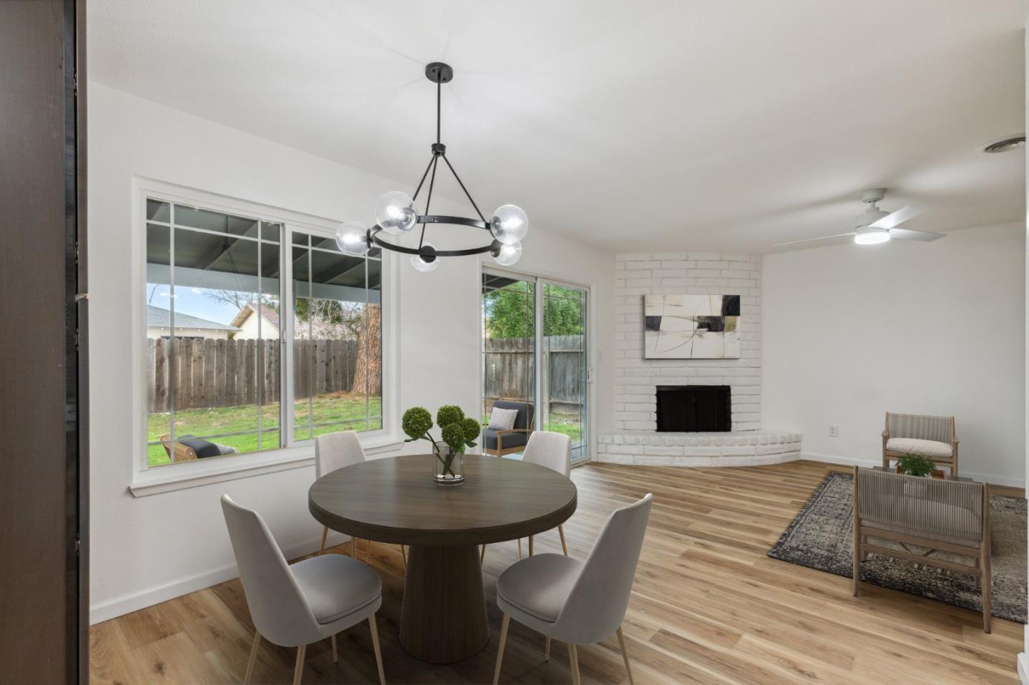 1413 Clevenger Drive Modesto, CA 95356 - Photo 5 of 37 a view of a dining room with furniture window and outside view
