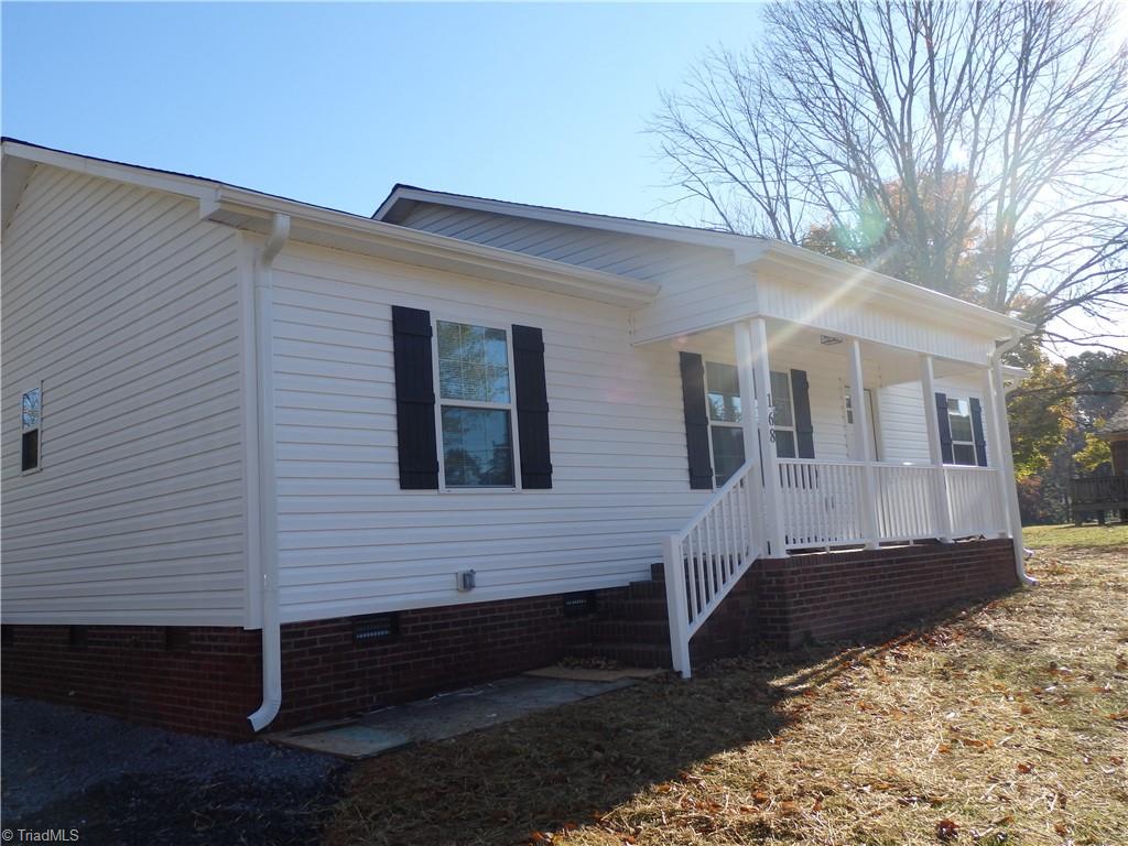 168 Old Camp Road Denton, NC 27239 - Photo 2 of 16 Front of home with covered porch