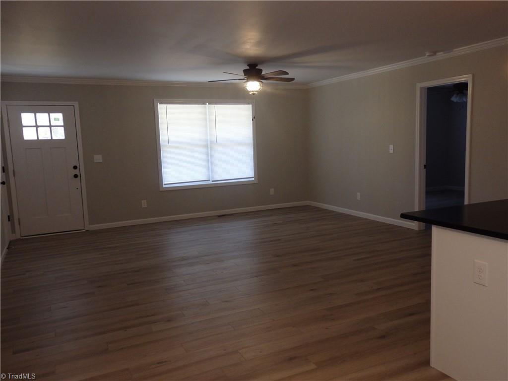 168 Old Camp Road Denton, NC 27239 - Photo 9 of 16 Livingroom-kitchen-dining with sliding glass doors