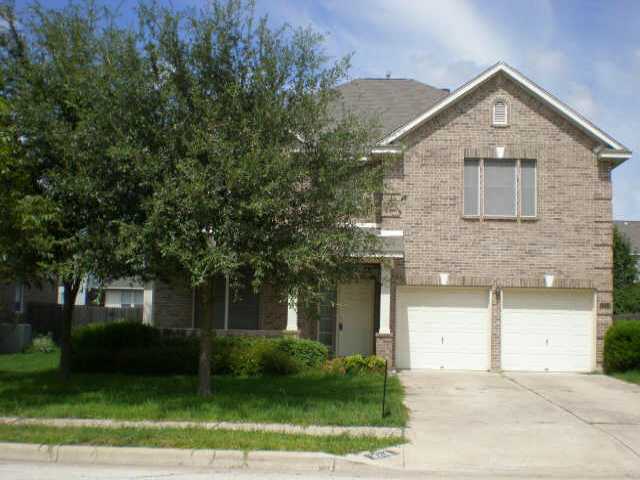 3214 Raging River Drive Austin, TX 78728 - Photo 1 of 1 a front view of a house with garden