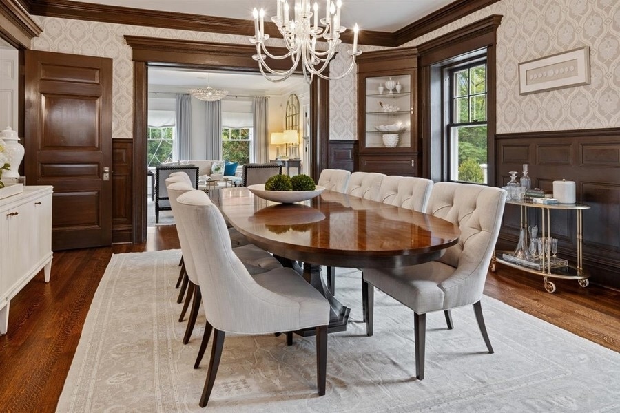 660 Prospect Avenue Winnetka, IL 60093 - Photo 14 of 77 a view of a dining room with furniture window and wooden floor
