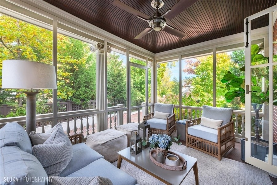 660 Prospect Avenue Winnetka, IL 60093 - Photo 39 of 77 a living room with furniture and a large window
