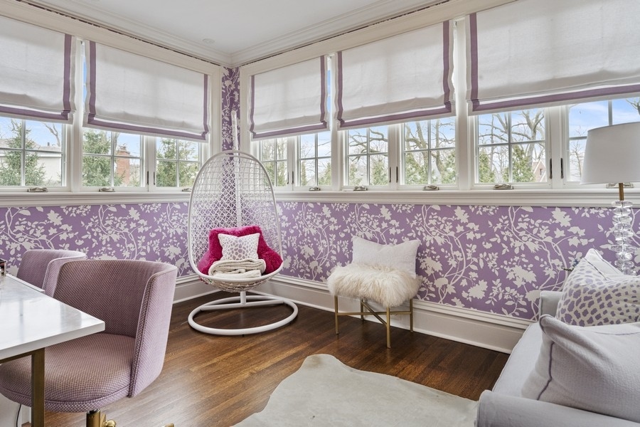 660 Prospect Avenue Winnetka, IL 60093 - Photo 51 of 77 a living room with furniture and a floor to ceiling window