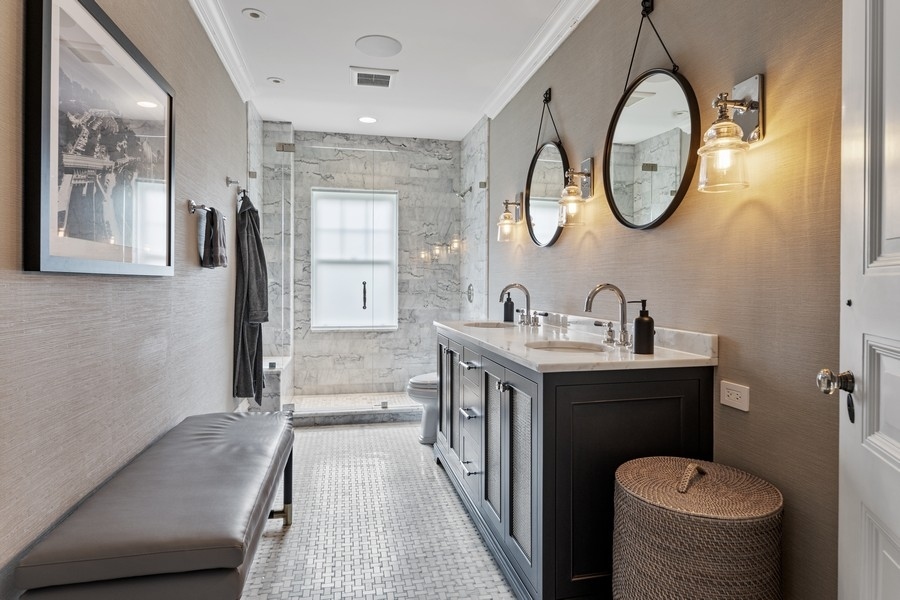 660 Prospect Avenue Winnetka, IL 60093 - Photo 59 of 77 a bathroom with a sink and a mirror